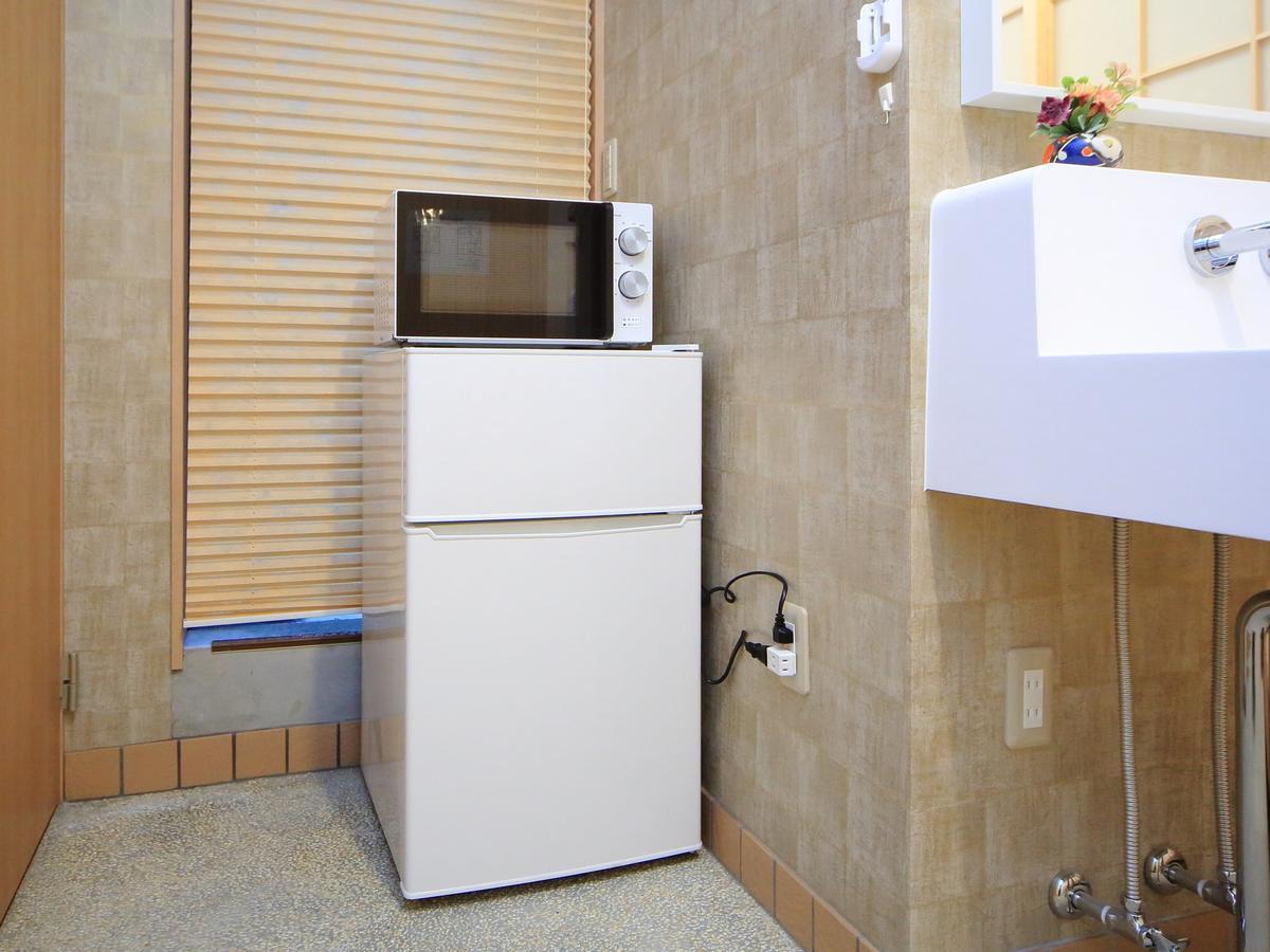 カモンイン 比永城町 Apartment