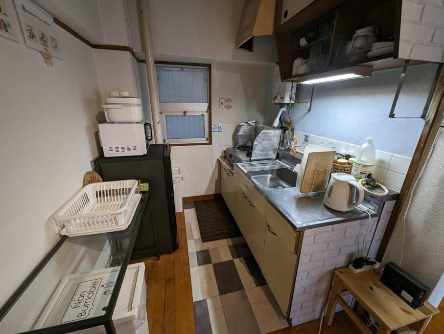Apartment 【豊和マンション稲荷302号室】伏見稲荷駅徒歩３分！free Wifi付のお宿！ Kyoto